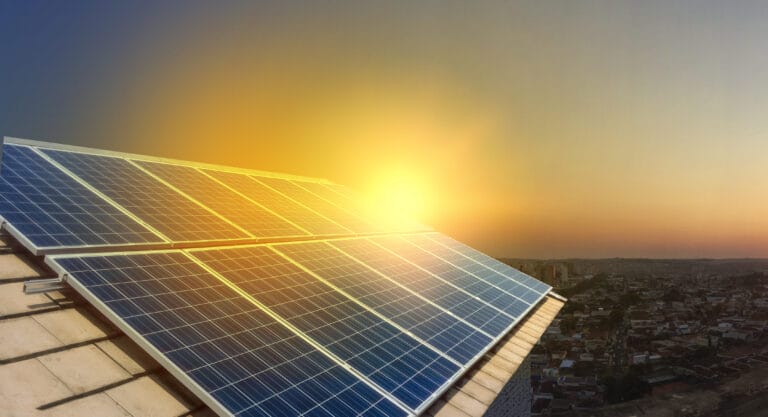 solar-power-panels-on-a-roof-at-sunset
